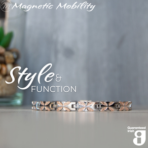 
                  
                    Load image into Gallery viewer, Front view of the Meadowsweet Dusk 4in1 magnetic bracelet by Magnetic Mobility, promoting arthritis, back pain, fibromyalgia relief with a stylish silver and rose gold butterfly design
                  
                