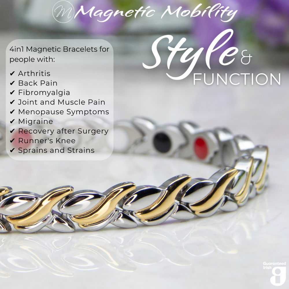 Close up view of the Virginia moon 4in1 Magnetic Bracelet from Magnetic Mobility. Features and intricate Silver and Gold twist with the 4in1 elements hidden in the back. Perfect for people with arthritis, back pain, fibromyalgia, joint and muscle pain, menopause symptoms, migraine and more. The bracelet is shown on a reflective surface with purple flowers behind it. 