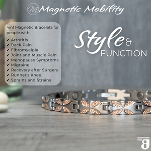 
                  
                    Load image into Gallery viewer, 45 degree view of the Meadowsweet Dusk 4in1 magnetic bracelet by Magnetic Mobility, promoting arthritis, back pain, fibromyalgia relief with a stylish silver and rose gold butterfly design.
                  
                