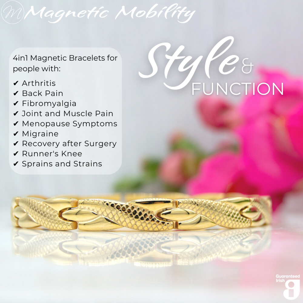 
                  
                    Load image into Gallery viewer, Front view of the Snapdragon Sun 4in1 Magnetic bracelet from Magnetic Mobility on a reflective surface. The bracelet is designed for people with arthritis, back pain, fibromyalgia, joint and muscle pain, menopause symptoms, migraine and more. Pink flowers are shown behind the bracelet. 
                  
                