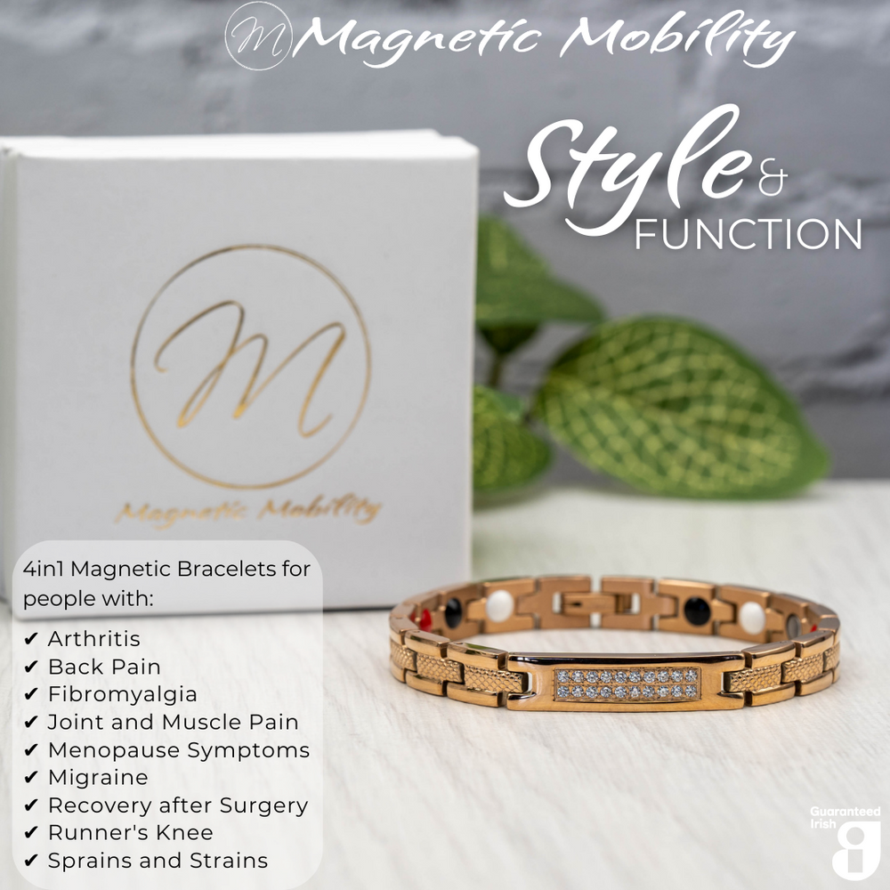 
                  
                    Load image into Gallery viewer, Front view of the Honesty Dawn 4in1 magnetic bracelet by Magnetic Mobility, promoting arthritis, back pain, fibromyalgia relief with a stylish rose gold design featuring a central panel with sparkling crystals. The bracelet is shown in front of its luxury white gift box.
                  
                