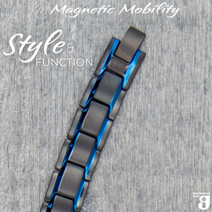 
                  
                    Load image into Gallery viewer, Alexanders Sky Magnetic Bracelet displayed on a wooden background for arthritis and muscle pain relief - Magnetic Mobility
                  
                