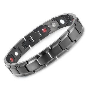 
                  
                    Load image into Gallery viewer, Alexanders Night 4in1 magnetic bracelet by Magnetic Mobility, featuring a sleek black design with embedded therapeutic elements. Ideal for alleviating arthritis, back pain, fibromyalgia, and other joint and muscle pain.
                  
                