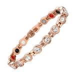 Angelica's Dawn 4in1 Magnetic Bracelet from Magnetic Mobility featuring Swarovski crystals on the front and 4in1 elements on the back, including neodymium magnets, FIR elements, germanium, and negative ions. Elegant rose gold design for style and pain relief.