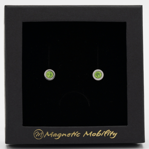 
                  
                    Load image into Gallery viewer, Magnetic Mobility August Birthstone Stud Earrings featuring peridot green Swarovski crystals, elegantly presented in a black box with Magnetic Mobility branding. These magnetic back earrings offer stylish pain relief.
                  
                