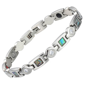 
                  
                    Load image into Gallery viewer, Avens Star 4in1 magnetic bracelet by Magnetic Mobility, featuring elegant design with neodymium magnets, FIR elements, germanium, and negative ions. Helps alleviate arthritis, back pain, fibromyalgia, joint and muscle pain, menopause symptoms, migraine, recovery after surgery, runner&amp;#39;s knee, sprains and strains
                  
                