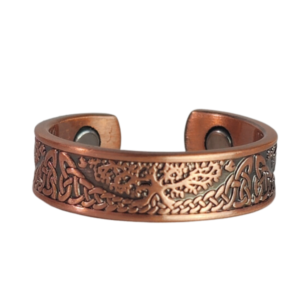 Buckthorn copper ring by Magnetic Mobility featuring an intricate Tree of Life design. This adjustable ring is designed to be easily worn on arthritic fingers, providing both style and functionality.