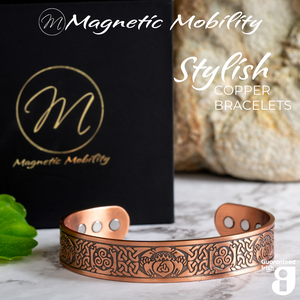 
                  
                    Load image into Gallery viewer, Front view of the Claddagh Copper bracelet from Magnetic Mobility. The bracelet features a Claddagh design of 2 hands holding a heart with a Triquetra sign in the middle. A classic Irish design with intricate Irish knots on the sides of this copper bracelet. 
                  
                