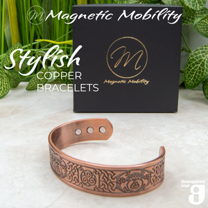 
                  
                    Load image into Gallery viewer, 45 degree view of the Claddagh Copper bracelet showcasing the strong neodynimum magnets in the back. Perfect for people with arthritis, this copper bracelet is packaged in a luxury black gift box. 
                  
                