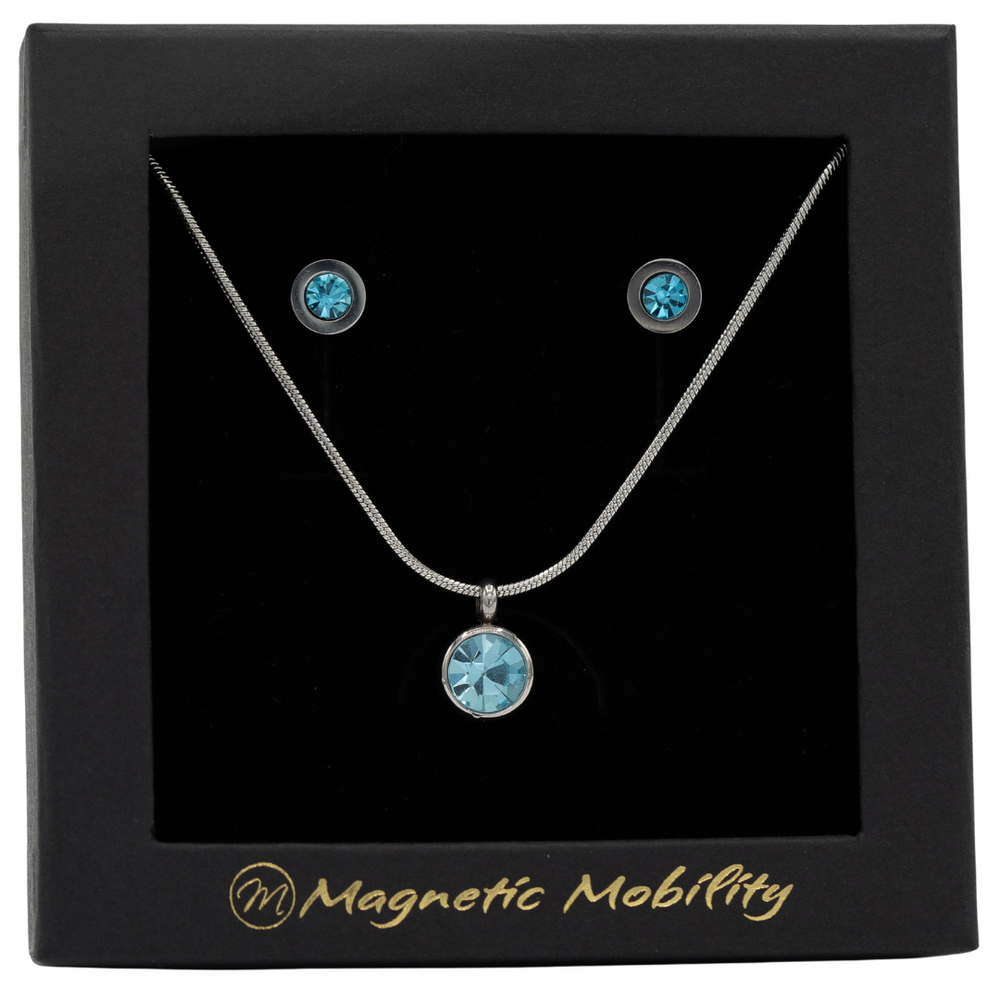 
                  
                    Load image into Gallery viewer, March Magnetic Mobility Birthstone Gift Set featuring a Magnetic Necklace and Stud Earrings featuring aquamarine Swarovski crystals, elegantly presented in a black box with Magnetic Mobility branding. These magnetic back earrings offer stylish pain relief.
                  
                