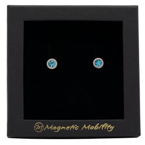 
                  
                    Load image into Gallery viewer, Magnetic Mobility March Birthstone Stud Earrings featuring aquamarine Swarovski crystals, elegantly presented in a black box with Magnetic Mobility branding. These magnetic back earrings offer stylish pain relief.
                  
                