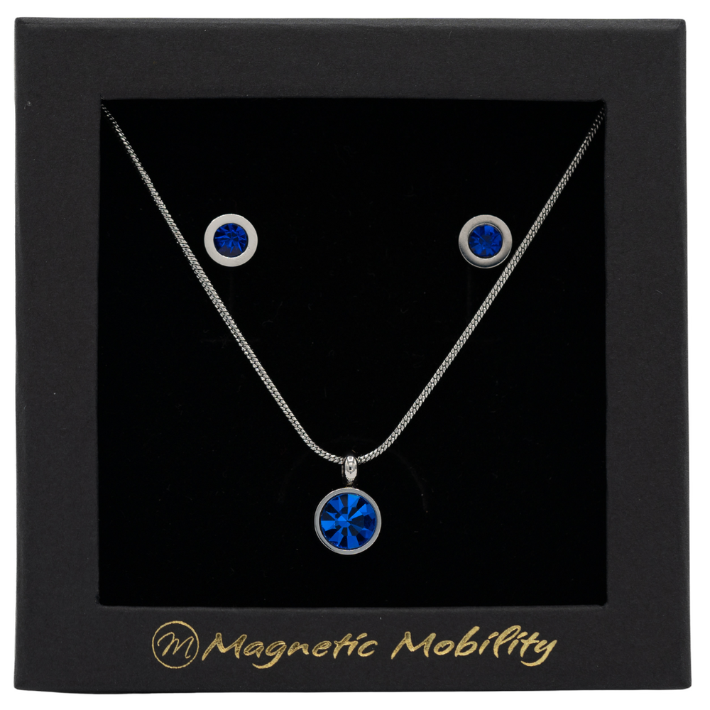 
                  
                    Load image into Gallery viewer, September Magnetic Mobility Birthstone Gift Set featuring a Magnetic Necklace and Stud Earrings featuring sapphire blue Swarovski crystals, elegantly presented in a black box with Magnetic Mobility branding. These magnetic back earrings offer stylish pain relief.
                  
                