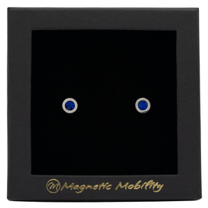 
                  
                    Load image into Gallery viewer, Magnetic Mobility September Birthstone Stud Earrings featuring saphire blue Swarovski crystals, elegantly presented in a black box with Magnetic Mobility branding. These magnetic back earrings offer stylish pain relief.
                  
                