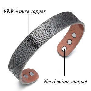 
                  
                    Load image into Gallery viewer, Stylish copper magnetic bracelet from Magnetic Mobility, featuring intricate geometric design and guaranteed Irish quality. The copper bracelet is presented on a reflective surface with the words &amp;quot;Style and Function&amp;quot;.
                  
                