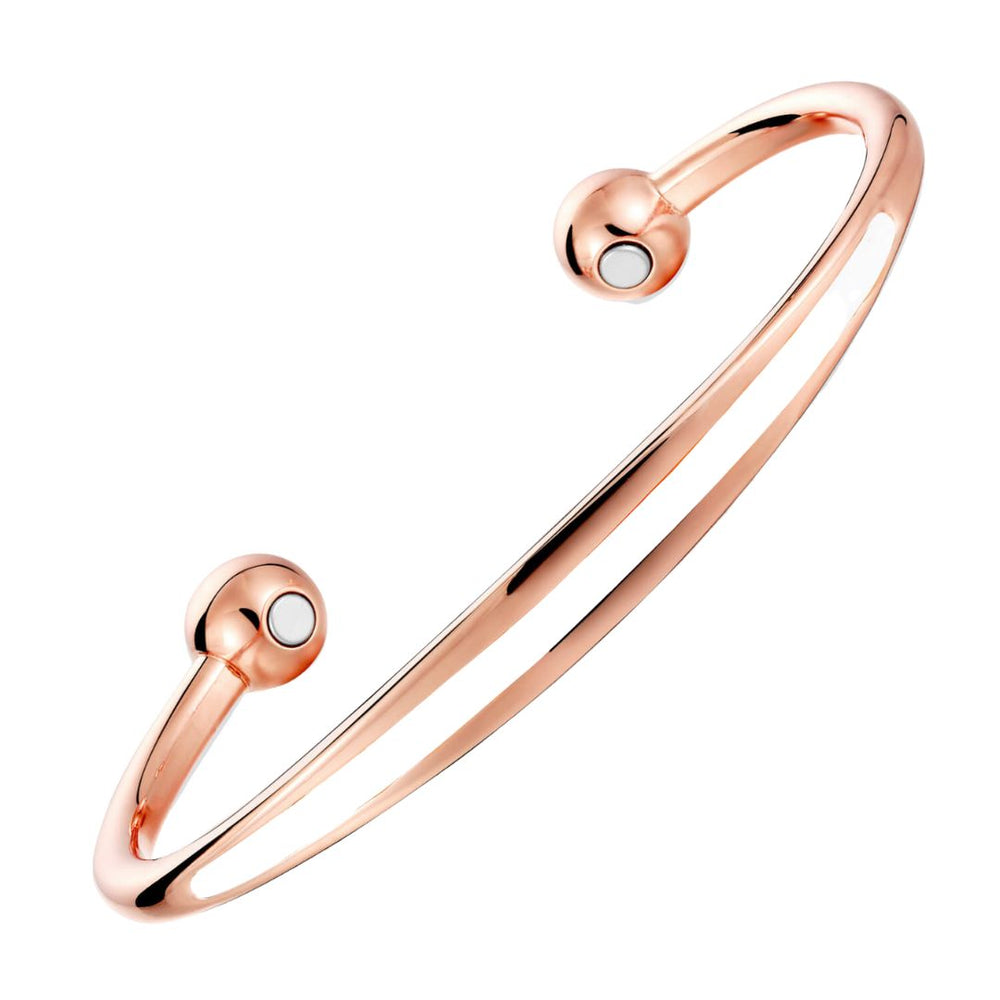 Spindle Dawn Copper bracelet from Magnetic Mobility. A copper bracelet with a simple design and an white band in the centre. Featuring 2 strong neodymium magnets. Perfect for people with arthritis and back pain. 99% pure copper. 