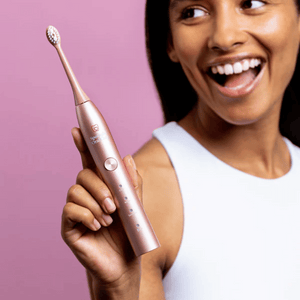 
                  
                    Load image into Gallery viewer, Spotlight Oral Care Sonic Tooth Brush-Rose Gold
                  
                